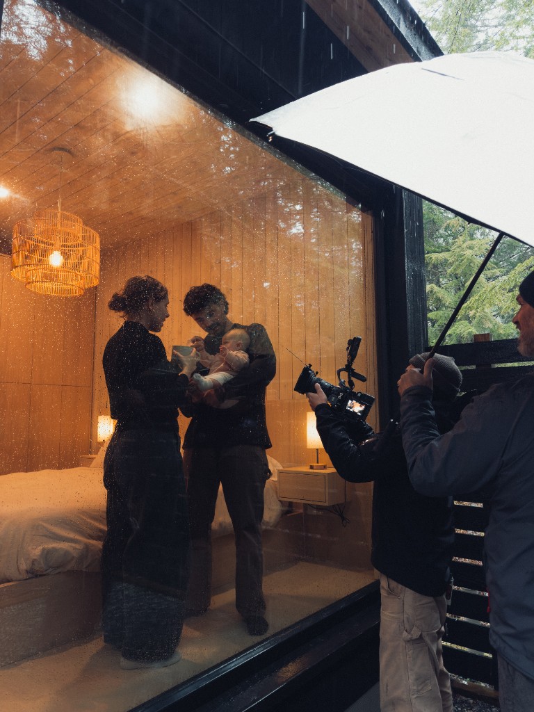 Filming client testimonial through cabin window